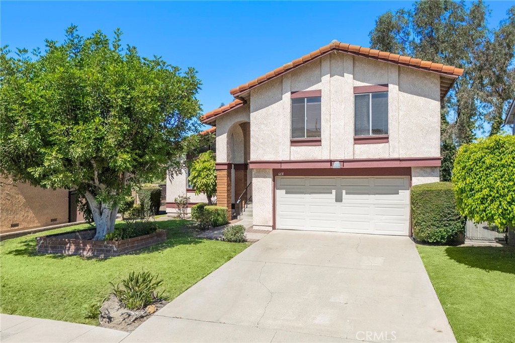 Perched in the desirable hills of Anaheim, this 3-bedroom, 2.5-bath home spans nearly 1,950 sq ft and offers sweeping canyon, city-light and snow-capped winter views that set the perfect backdrop for everyday living. The spacious floor plan includes soaring ceilings, formal living and dining rooms, breakfast nook, and a cozy family room with a fireplace that opens to the backyard patio. Upstairs, the primary suite, with en-suite bathroom, offers a peaceful retreat with plenty of natural light, offering beautiful scenery, two secondary bedrooms and full bathroom. The home is ready for someone's personal touch; it presents incredible opportunity to become a dream residence in one of Anaheim Hills’ most sought-after neighborhoods. Complete with an attached 2-car garage and a great location close to top-rated schools, parks, shopping, and entertainment, this home is a must see.