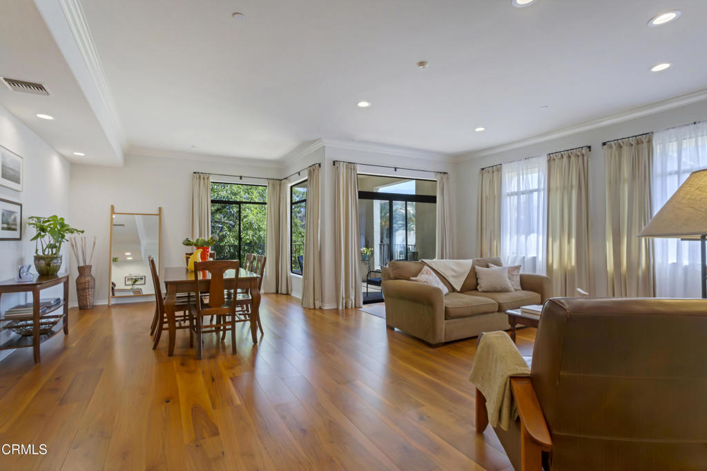 Priced to sell--seller has purchased another home and is ready to move forward. Rarely available NE corner residence at The Hudson, a boutique luxury building designed by renowned architect William Hefner. Unit 403 offers over 1,800 sq ft of single-level living with a private elevator opening directly into the unit's own foyer--no shared hallways. The open floorplan features abundant natural light and oversized windows. Three spacious bedrooms and one full bathroom and two 3/4 baths, including a light-filled spacious primary suite with mountain views, walk-in closet and a bathroom with soaking tub and sperate stall shower. The updated chef's kitchen includes stainless steel appliances, ample cabinetry, and generous prep space. Recently remodeled meet 2025 standards, recessed lighting, and smart-system readiness. Private 4-car garage with independent, fully enclosed bays and remote-controlled garage doors--not open stalls. Quiet 15-unit building just blocks from Lake Ave, Vroman's, Pasadena Playhouse, Trader Joe's, and the Gold Line.