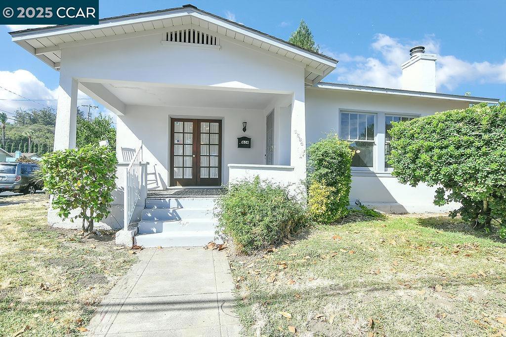 Opportunity knocks with this Spacious & Charming 2-bedroom, 1-bath fixer nestled on a big corner lot. Inside, you’ll find a large kitchen, flex space that can be an office or a dining nook near the formal dining room. Enjoy the light & bright Living Room with the Cozy Wood Burning Fireplace. One of the bedrooms also includes an additional bonus room, offering the potential for a third bedroom, playroom, or private retreat. A dedicated laundry room off of the Kitchen. Charming Built-ins located in the Formal Dining Room & Flex Space. Lots of storage throughout. Huge Basement with even more storage possibilities. Outside, enjoy a spacious yard with room to garden, entertain, or expand. Central Heating. Hardwood Floors. ROOF approx 2.5 years old. The home’s layout feels open with the high ceilings, giving you a canvas to reimagine and make it your own. Walk to Vibrant Downtown Martinez, Farmers Market, Coffee Shops, Restaurants, Breweries and Shopping. Don't miss this opportunity!