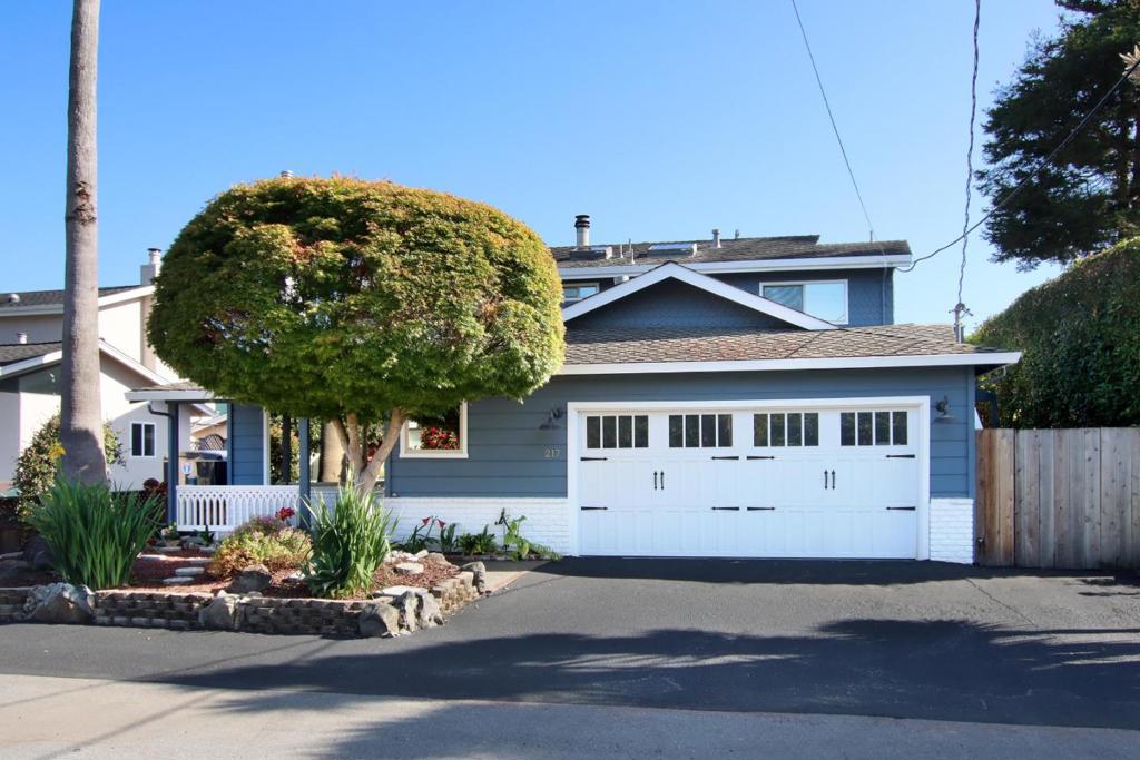 In the Heart of Seacliff! Large, spacious 2600+ sq ft, 5 bedroom home with 3 full baths and 2 car garage. All just minutes walk to everyone's favorites.... Seacliff State Beach, Manuel's restaurant, Marriane's Ice Cream, Nisene Marks State Park, Skate Parks, Farmers Market, and more! All living area and 2 bedrooms and 2 baths are downstairs with 3 additional bedrooms upstairs with separate entrance. Gorgeous remodeled kitchen with quartz counters and upgraded appliances and loads of storage. Large south facing sun deck with ocean peeks, private fenced rear yard, low maintenance landscape, and off street parking! Move on in...the entire interior was just repainted, beautifully remodeled kitchen and baths, separate family room and living room, hardwood floors and new carpet throughout! This is a rare home in Seacliff due to the square footage and bedrooms-perfect for large extended family or the perfect beach house for all your friends and family!
