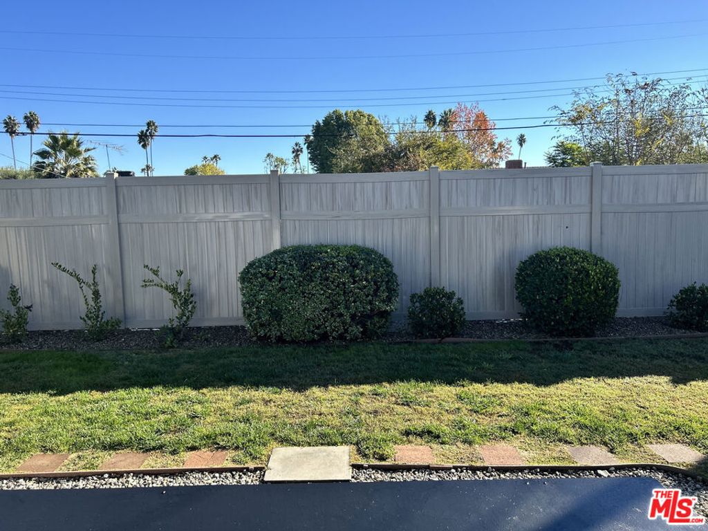 Photo of 6448 Lubao Avenue, Woodland Hills, CA 91367 (MLS # 25626423)