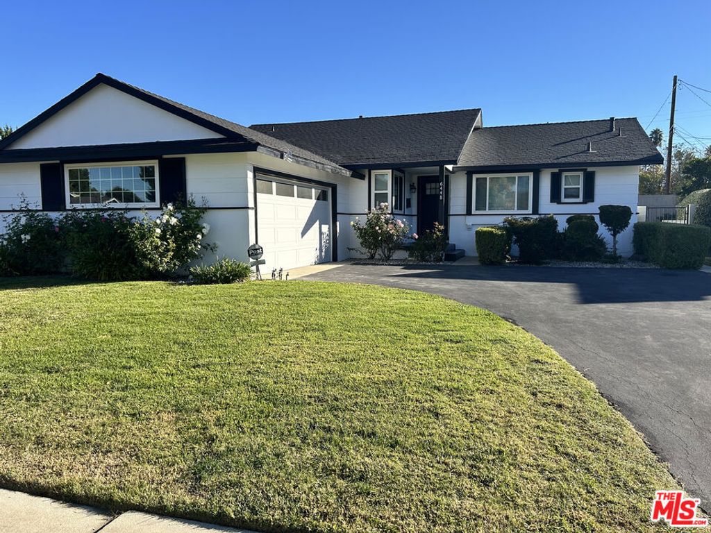 Photo of 6448 Lubao Avenue, Woodland Hills, CA 91367 (MLS # 25626423)