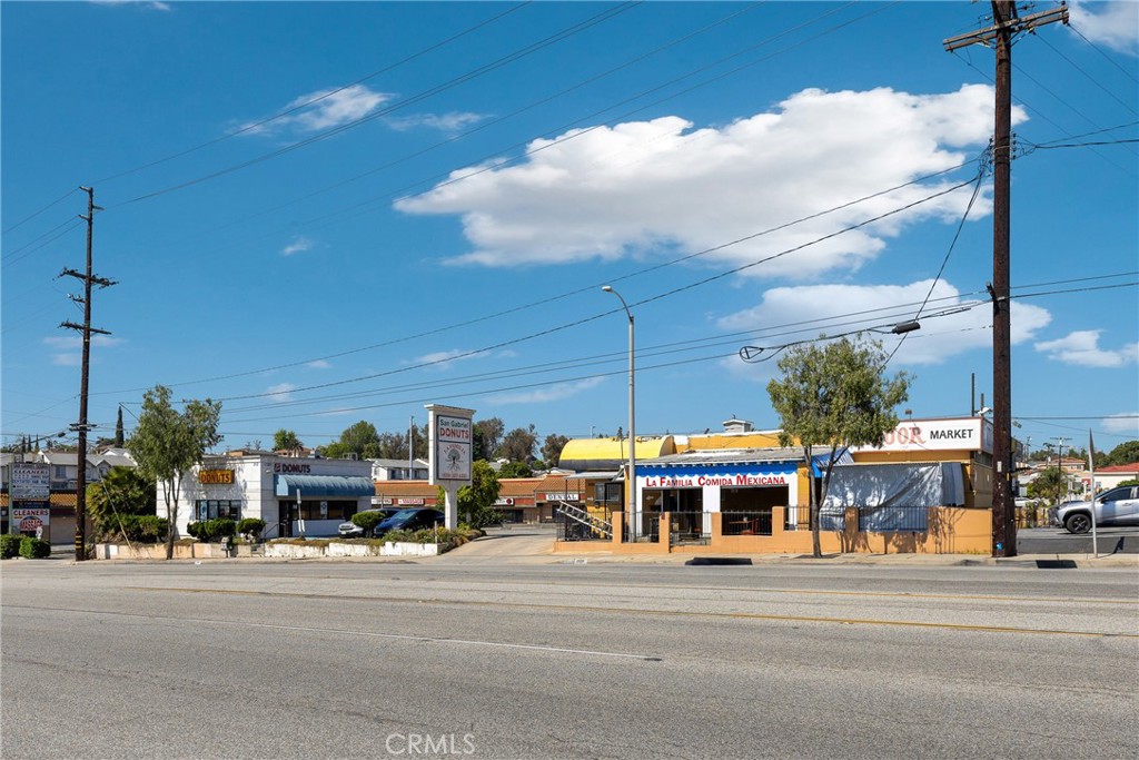 This exceptional corner commercial property offers a rare opportunity to own a 3-unit retail center with outstanding visibility and access on busy San Gabriel Blvd. On the market for the first time since 1999, this property has been held by long-time owners and is currently occupied by a Liquor Store, Mexican Restaurant, and Donut Shop—making it a great investment or owner-user opportunity. Located at a high-traffic intersection, the property benefits from ingress and egress on both San Gabriel Blvd and La Merced Rd, along with a monument sign for added marketing exposure. With over 24,000 cars passing daily, the site provides unmatched street visibility and accessibility. The property is walking distance to multiple major intersections, including San Gabriel Blvd & Graves Ave and San Gabriel Blvd & Rush St/Potrero Grande Dr, and is just 0.4 miles from Walmart Supercenter. It also offers convenient access to public transportation, making it ideal for customers and tenants.