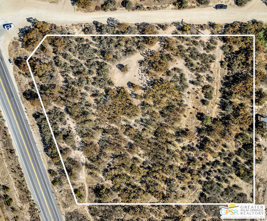 Prime 2.17-acre corner lot in Anza, ideally situated at the intersection of Highway 371 and Trails West. Zoned RR5 (Rural Residential), offering versatile development opportunities. The property is on the Anza Community Well and includes a 1 1/4" water line already installed on-site. An electrical pole is also located on the property, ready for hookup. Survey has been completed. This is a great opportunity for a variety of residential or agricultural uses.
