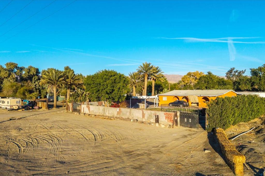 Exceptional chance to acquire around 9.76 acres of land in Coachella. This property includes a water well, approximately 420 date palm trees, and three electric meters. The true value lies in the land itself. Financing options are available for this property.'