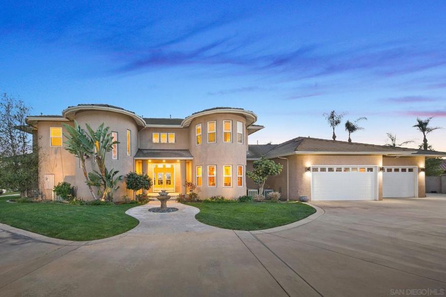 Nestled atop the prestigious heights of Shadow Mountain on a tranquil cul-de-sac, this exquisite custom-built estate is a true embodiment of luxury, elegance, and architectural brilliance. Thoughtfully designed with an open-concept layout, the home boasts four generously appointed bedrooms, three full baths, and two half baths. Set upon a pristine .68-acre lot, the outdoor living spaces are nothing short of spectacular—lush landscaping frames a resort-style pool and spa, while a fully equipped outdoor kitchen and BBQ area create the perfect setting for lavish entertaining. Sweeping panoramic views extend across the city, rolling hills, and all the way to the ocean, offering an ever-changing canvas of natural beauty. At the heart of the home, a stunning circular gourmet kitchen—adorned with high-end appliances—flows seamlessly into a sophisticated dining area, a plush living room anchored by a striking marble fireplace, and an inviting pull-up bar. Expansive windows bathe the interiors in natural light, accentuating soaring ceilings and impeccable designer finishes. A dedicated poolside half-bath enhances convenience, while an oversized three-car garage with an attached office, RV parking, and ample guest parking provide both luxury and practicality. Built by its original owner with an unwavering commitment to craftsmanship, this extraordinary estate presents a rare opportunity to own a masterpiece in one of East San Diego County’s most distinguished communities.