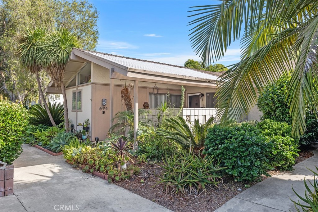 This unique Single-level with no one above or below La Corona Model offers 2 Bedrooms, a Jack & Jill Bathroom, and 850 Square Feet of living space, which appears larger due to the incredible floorplan and vaulted ceilings. Spacious living room, light & bright with natural light coming in through the sliding glass door leading out to the rear garden/patio, and a window facing the covered patio, allowing a breeze to flow through the home. Sizeable Eat-in kitchen with Sliding glass doors that open onto a favorite feature, the covered front patio. The front patio adds more space to this indoor/outdoor home. Appliances are owned & maintained by the HOA. Carport 507 space # 9. The carport has storage cabinets. Bathrooms and a bedroom are freshly painted. Make this your next home and start living an incredible lifestyle. Laguna Woods Village amenities are 7 Clubhouses, 5 Pools, 2 Fitness Centers, Tennis & Pickleball Courts, A Library, Bookclubs, 2 Professional Golf Courses, a Driving Range, A Restaurant, Stables, Duplicate Bridge, Bocce ball, Wood-Working, Photography, Painting, Ceramics, and more. There are approximately 200+ clubs & organizations providing a resort-style environment. Close to Restaurants, Shopping, Entertainment, Medical facilities, approximately 8 miles from Laguna Beach, & Easy Freeway Access