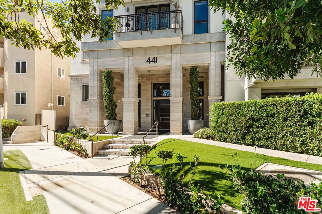Introducing 441 S. Barrington, Unit 109, perfectly positioned in the heart of Brentwood. This sophisticated two-bedroom, two-and-a half-bath condo features a thoughtfully designed open layout with warm wood flooring and contemporary finishes throughout. The gourmet kitchen is appointed with top of the line appliances, sleek cabinetry, and a modern aesthetic that connects seamlessly to the dining and living areas. The unit is equipped with washer/dryer, spacious bedroom and bathrooms, a private patio and high-end finishes and appliances throughout. The Cosmopolitan BW is an intimate collection of 45 modern luxury residences that blend style, comfort, and convenience. Residents enjoy a curated selection of amenities, including a 24-hour doorman with secure private access, a state-of-the-art fitness center, heated swimming pool, outdoor lounge with fire pit, and a tranquil meditation garden. Just moments from Barrington Recreation Center, local cafes, and neighborhood shops, this unit offers an exceptional balance of sophistication, ease, and desirable Westside living.