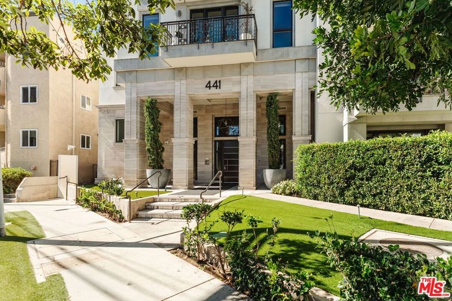Introducing 441 S. Barrington, Unit 109, perfectly positioned in the heart of Brentwood. This sophisticated two-bedroom, two-and-a half-bath condo features a thoughtfully designed open layout with warm wood flooring and contemporary finishes throughout. The gourmet kitchen is appointed with top of the line appliances, sleek cabinetry, and a modern aesthetic that connects seamlessly to the dining and living areas. The unit is equipped with washer/dryer, spacious bedroom and bathrooms, a private patio and high-end finishes and appliances throughout. The Cosmopolitan BW is an intimate collection of 45 modern luxury residences that blend style, comfort, and convenience. Residents enjoy a curated selection of amenities, including a 24-hour doorman with secure private access, a state-of-the-art fitness center, heated swimming pool, outdoor lounge with fire pit, and a tranquil meditation garden. Just moments from Barrington Recreation Center, local cafes, and neighborhood shops, this unit offers an exceptional balance of sophistication, ease, and desirable Westside living.
