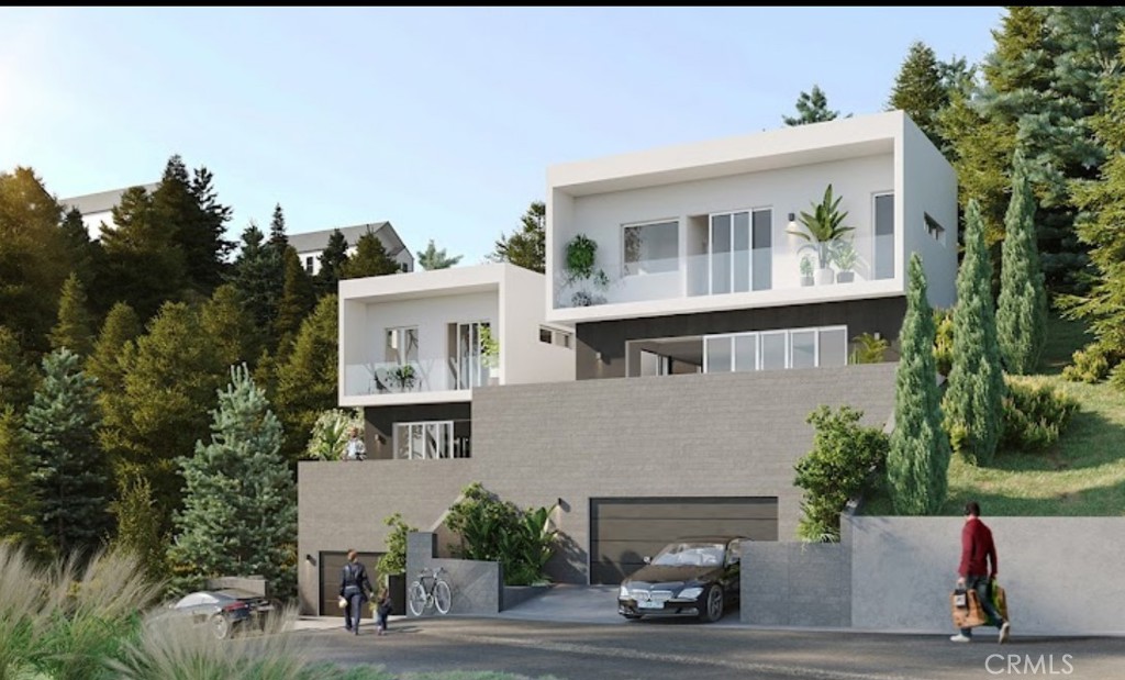 Perfect opportunity for a developer or owner-user to build in one of the most scenic hillside communities. Located in the desirable Highland Park area near Eagle Rock, this lot offers breathtaking panoramic views stretching from Downtown Los Angeles to Palos Verdes. Design a custom driveway leading to your view home and enjoy the serenity, privacy, and inspiration of hillside living. The seller has a conceptual drawing available for review featuring a 3-bedroom, 3.5-bathroom home with a study room, an attached 2-car garage, and approximately 1,800 square feet of living space. Please note, the plans have not yet been submitted to or approved by the City of Los Angeles. The adjacent lot is also available for sale (MLS# AR25143806), offering added potential and flexibility for future development. This is an exceptional opportunity to build with scale, privacy, and unmatched views.