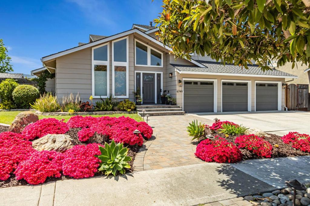 Stunning Almaden Corner-Lot Home! Tucked into the desirable Country Club area neighborhood, this beautifully remodeled home offers resort-style living with a serene backyard, sparkling pool, and energy-efficient owned solar. Gorgeous landscaping surrounds this home, highlighted by vibrant purple 'Magic Carpet' ground cover that bursts into bloom every Spring, as captured in the photos. Inside, a sun-drenched living room greets you at the front door, leading you to a spacious and gorgeous designer-kitchen. With a thoughtfully designed layout, one of the five bedrooms is located downstairs and includes a Murphy bed, making it the perfect flexible space for a guest suite, home office, or additional bedroom. Additionally, the second half of the first floor can be completely closed off, creating a private living area with its own bedroom, bathroom, and living room, ideal for multigenerational living or hosting extended guests. Functionality, sophistication and beauty; all of this, while also being tied to top rated Almaden schools. This is a home not to be missed! Welcome Home!