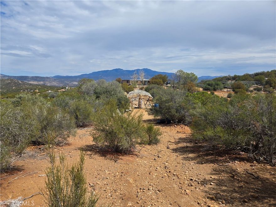 4.82 acres zoned residential R-R-10 in Anza. This lot is off the beaten path but still accessible near the Pacific Crest Trail. The lot has a pad area with great mountain and valley views. Located at 4093 elevation you can enjoy the 4 season weather including a few snow days each year. Come build your dream homestead or country getaway property.