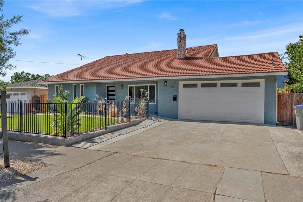 Experience modern living at 875 E. Taylor Street, located only 1 mile away from San Jose's vibrant Japantown! This extensively remodeled 2-level single family home offers 4 spacious bedrooms and 3 full bathrooms, along with a half bath in the attached garage for added convenience. FULLY PERMITTED. Upon walking in, you're greeted with high vaulted ceilings and a beautiful living room. Primary suite is located on the ground floor with a full bath. Upstairs, a junior suite with a full bath is complemented by two spacious bedrooms sharing a hallway bath. This home has modern finishes, new flooring, new interior and exterior paint, remodeled kitchen with quartz countertops, new cabinets, and modern bathrooms with high-end Kohler faucets and LED mirrors. Both yards have plenty of mature fruit trees - oranges, pomegranates, and more! Indoor laundry room with washer and dryer included. Kitchen is fully equipped with brand new stainless steel appliances. Built in 1975, this home is more modern than its historic neighbors, marrying timeless appeal with present-day touches. Nestled away from the hustle and bustle of downtown, yet close enough for ultimate convenience, you'll find yourself within walking distance of Japantowns amazing restaurants and shops!