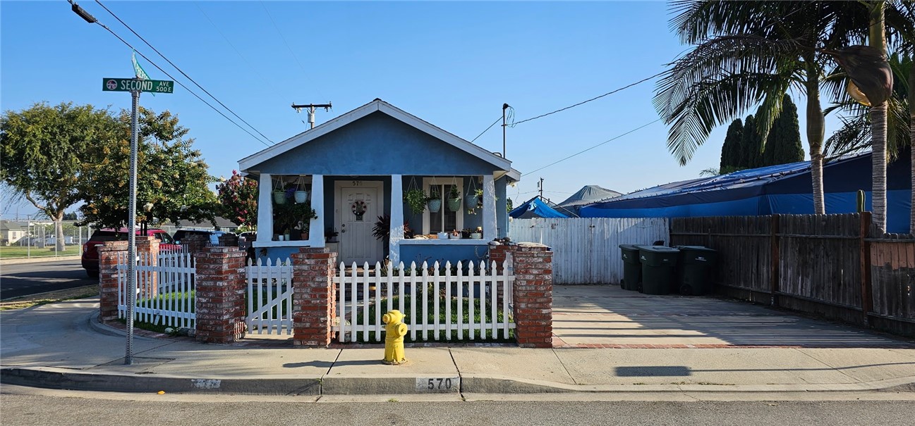 Discover this inviting 2-bedroom, 1-bath home offering 921 sq ft of living space on a generous 5,484 sq ft lot. Built in 1916, this single-story property features classic architectural charm with endless potential for updates. The spacious backyard is perfect for entertaining, gardening, or simply enjoying the outdoors. Conveniently located near local shopping, dining, and schools. A great opportunity for first-time buyers, investors, or those looking to downsize without sacrificing outdoor space.