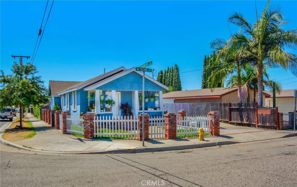 Discover this inviting 2-bedroom, 1-bath home offering 921 sq ft of living space on a generous 5,484 sq ft lot. Built in 1916, this single-story property features classic architectural charm with endless potential for updates. The spacious backyard is perfect for entertaining, gardening, or simply enjoying the outdoors. Conveniently located near local shopping, dining, and schools. A great opportunity for first-time buyers, investors, or those looking to downsize without sacrificing outdoor space.