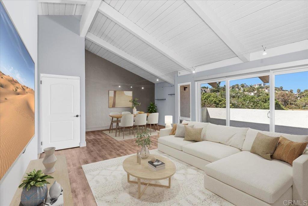 Welcome to 7512 Viejo Castilla #21 — a beautifully updated, top-floor condo offering style, comfort, and convenience in the heart of La Costa. Step inside and be greeted by soaring vaulted ceilings that fill the space with natural light, creating a warm and inviting atmosphere. This west-facing unit features two spacious bedrooms and two full bathrooms, thoughtfully designed for both functionality and comfort. The updated kitchen boasts stainless steel appliances and a skylight that adds even more brightness and charm. Enjoy seamless luxury vinyl plank flooring throughout and take in panoramic views from the expansive west-facing deck — recently tiled and perfect for relaxing evenings or entertaining guests while watching the sunset. Ideally located near the renowned Omni La Costa Golf Course, as well as shopping, dining, and world-class beaches, this condo offers the best of coastal living. Community amenities include a pool, elevator, two dedicated parking spots, and water and trash service. Whether you're looking for a primary residence, vacation getaway, or investment opportunity, this turn-key home checks all the boxes. Don’t miss your chance to own this exceptional property!