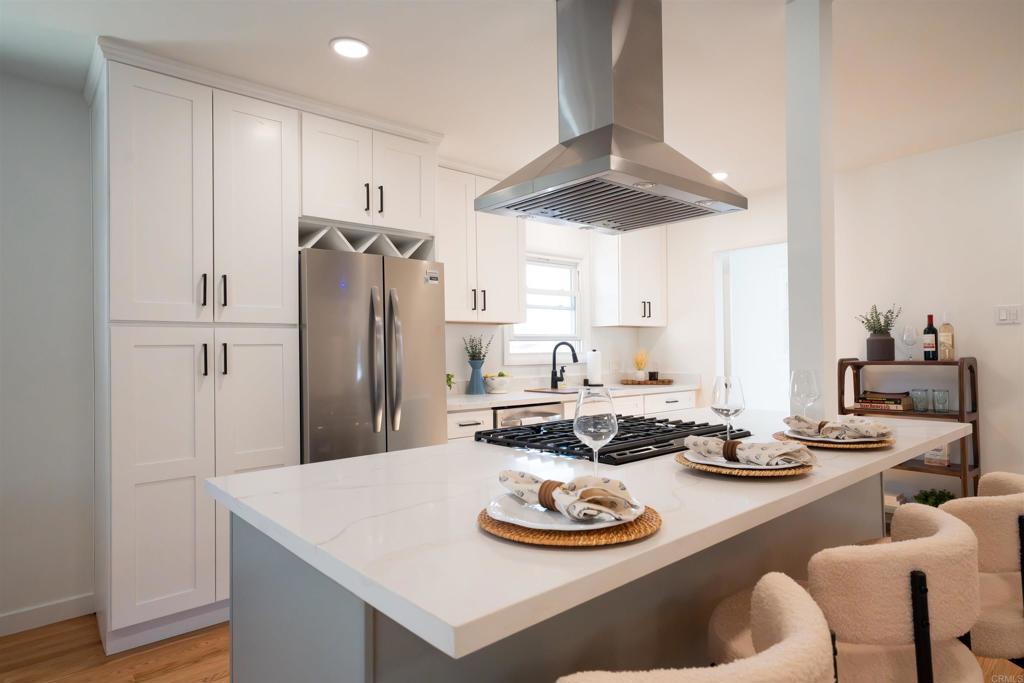 This beautifully renovated 3-bedroom, 2-bathroom residence perfectly blends modern updates with timeless charm. Move-in ready. Enjoy gleaming hardwood floors, an open floor plan, and a brand-new kitchen with energy-efficient appliances and modern finishes. The home also features a separate laundry room, updated baths, high efficiency mini-split air conditioning and an attached single-car garage. This home, centrally located in one of San Diego’s most desirable neighborhoods, offers peace and privacy while keeping you close to everything — just minutes from SDSU, shopping, dining, downtown, and the beach. Don’t miss this one!