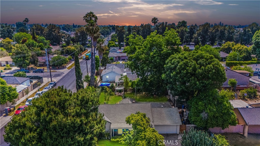 9600 SQFT CORNER LOT!! Endless possibilities to build an ADU, Expand the home, Construct a Pool or even a SB9 Subdivided Unit! Welcome to 7356 Darby Avenue—a delightful 2-bedroom, 1-bathroom home offering 1,118 sq. ft. of comfortable living space on an expansive 9,633 sq. ft. lot. Situated on a desirable corner lot, this property features hardwood floors, ceiling fans throughout, and abundant natural light. The spacious living area flows seamlessly into the kitchen and dining space, creating an inviting atmosphere for everyday living or entertaining. Enjoy direct access from the attached 2-car garage, with a driveway offering additional parking for two vehicles. Step outside to a large covered patio—perfect for relaxing or hosting gatherings—and take advantage of the oversized lot, which provides endless possibilities for gardening, play, or future expansion. Conveniently located near shopping, dining, parks, and schools, this home combines comfort, charm, and potential. Don’t miss the opportunity to make it yours!