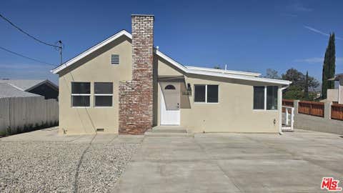 Photo of 10323 Samoa Avenue, Tujunga, CA 91042 (MLS # 26888901)