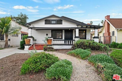 Photo of 5515 Ruthelen Street, Los Angeles, CA 90062 (MLS # 26650923)