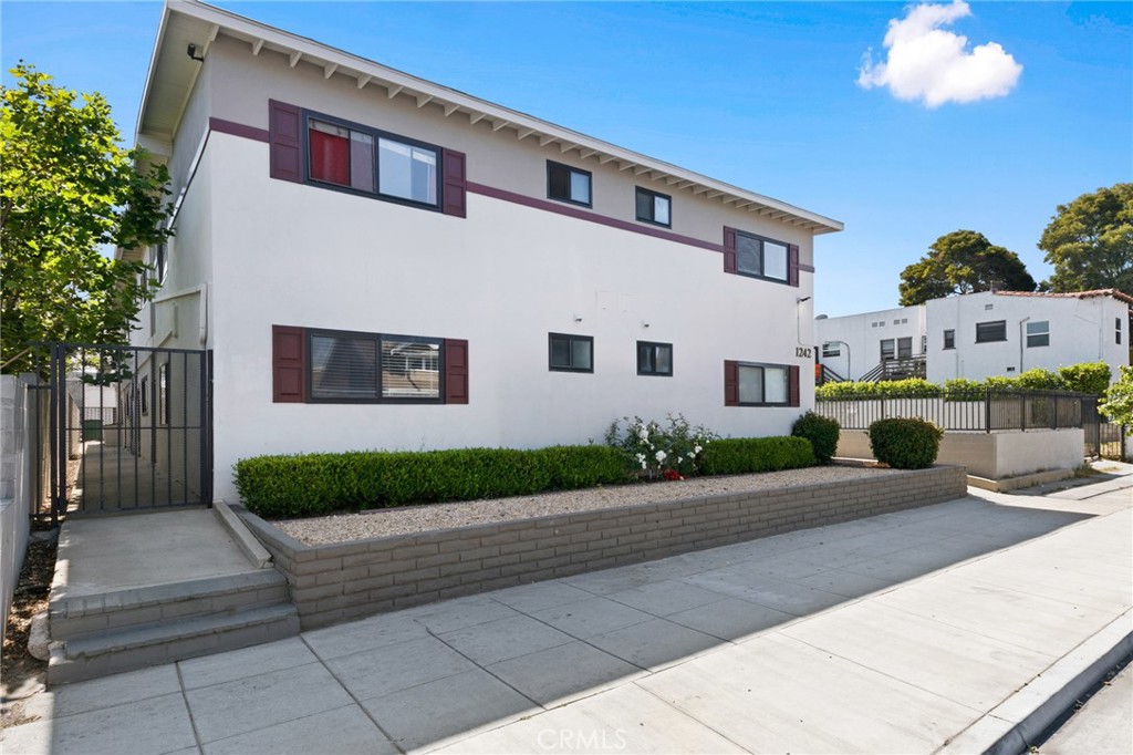 1242 Cedar Avenue is a 12-unit apartment asset located in Downtown Long Beach. The asset is priced at 6.57% cap rate and 10.12 GRM at current rents. The property is comprised of (9) 1 Bed/1Bath units and (3) 2 Bed/1 Bath units. Seven of the 12 units are fully renovated with new flooring and modern kitchens and baths featuring designer fixtures and finishes. The secured-access building has undergone key capital improvements, including new windows, fresh exterior paint, and upgraded electrical systems throughout. Additional income is generated from on-site parking and tenant- accessible laundry facilities. With a Walk Score of 89, the property is ideally positioned for tenant convenience, offering close proximity to a wide range of amenities, including shops, restaurants, and entertainment venues. The location is also within walking distance of the East Village Arts District, one of Long Beach’s most vibrant and sought-after neighborhoods, known for its creative energy and strong rental demand. 1242 Cedar Avenue offers investors a well-maintained asset with upside in an infill location experiencing continued growth and revitalization.
