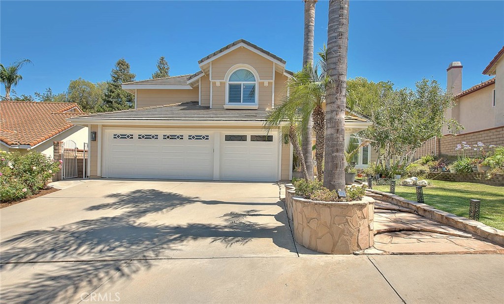 Great Location! Upgraded! This beautiful North Chino Hills property with 4 bedrooms 3 bathrooms (1 bedroom 1 bathroom downstairs), 3-car garage. Great curb appeal. Front door with glass panel. Light-filled Living room with high ceiling, formal dining room with custom crystal chandelier. Remodeled kitchen with granite counter tops, center island, stainless-steel appliances, including Jenn-Air kitchen hood, dishwasher and 6-burner stove. The charming breakfast nook—perfect for casual meals while enjoying serene views of the backyard. Cozy family room with a fireplace. A full bedroom and bathroom downstairs provide flexibility for guests, extended family, or a private home office. Upstairs, the oversized primary suite includes a luxurious en-suite bathroom and a private balcony overlooking the lush backyard—ideal for soaking up the California sun and enjoying tranquil morning views. Additional recent upgrades include a brand-new Lennox A/C and heating system, 2 split A/C units, wood shutters throughout, double-pane vinyl windows, crown moldings, roller shades, and fresh exterior repainting—giving this home both functionality and fresh curb appeal. The expansive backyard is a true highlight, complete with mature fruit trees, a large sparkling pool and spa, and a well-maintained lawn area offering plenty of space for entertaining, playing, or future customization. Situated in a quiet and highly desirable Chino Hills neighborhood, just minutes from top-rated schools, parks, shopping centers, and major commuter routes, this home offers the perfect blend of everyday convenience and luxurious suburban living.