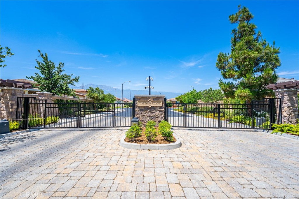 Built in 2015, this 3-bedroom, 2-bathroom residence offers 1,832 square feet of open-concept living designed for comfort, style, and functionality. The heart of the home is a spacious gourmet kitchen featuring granite countertops, a large center island, and custom cabinetry—perfect for entertaining or preparing family meals. Natural light pours into the adjoining family room, complete with a cozy fireplace, creating an inviting space for everyday living. The primary suite provides a peaceful retreat with a generous layout and an en-suite bath. Outside, the professionally landscaped front and back yards offer a serene outdoor escape with space for relaxing or hosting gatherings. The home also includes an attached 2-car garage. Located within a quiet, well-kept neighborhood, the property benefits from access to resort-style HOA amenities such as a pool, spa, clubhouse, playground, and more.