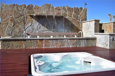 Photo of 61611 Alta Loma Drive, Joshua Tree, CA 92252 (MLS # JT26029592)