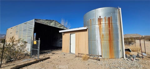 Photo of 42920 Carmer RD, Lucerne Valley, CA 92356 (MLS # HD26172769)