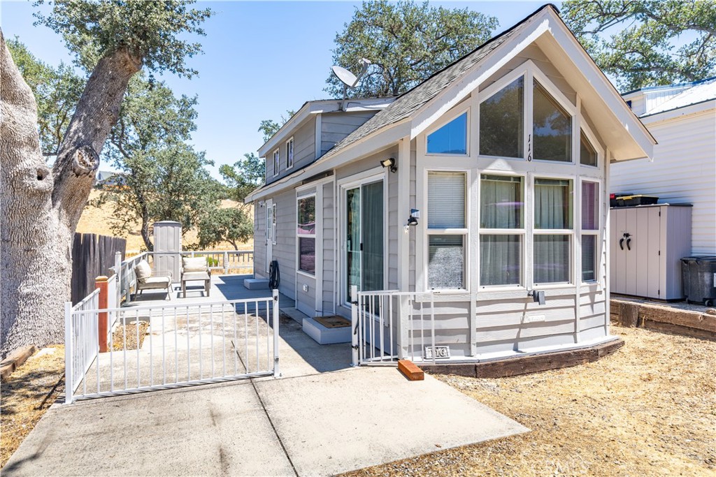 Tucked away in the scenic, gated community of Heritage Ranch near Lake Nacimiento, this charming 1 bedroom + loft park model home offers the perfect opportunity for a tiny home low-maintenance vacation retreat. Situated on an 1,800 sq ft view lot, the 450 sq ft home features vaulted ceilings and lots of windows that flood the space with natural light, creating a bright and airy atmosphere. The cozy sleeping loft provides additional space for guests, an office, or storage, while the efficient floor plan includes a full kitchen, comfortable living area, and private bedroom—thoughtfully designed to maximize every inch.
Enjoy morning coffee or evening sunsets from the spacious deck and take advantage of the parking and outdoor storage for lake toys or recreational gear. New roof installed 2 years ago with built-in bird deterrent, offering added protection against woodpeckers. It’s also an all-electric home, coupled with the newer roof can make it a great candidate for future solar installation.
Located on a peaceful cul-de-sac within walking distance to community amenities, this home includes access to Heritage Ranch’s private marina and boat launch on Lake Nacimiento, two swimming pools, equestrian center, pickleball and tennis courts, parks, campgrounds, and a community center that hosts seasonal events, concerts, and markets. Just minutes from Oak Hill Market, gas, dining, and a short drive to Paso Robles wine country, this affordable lake community lifestyle is perfect for full-time living or weekend getaways. Enjoy the serenity of nature with all the conveniences of a vibrant, active neighborhood.
