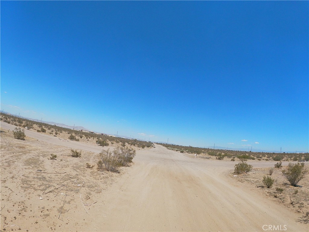 Adelanto Property land for sale so that you can build on the parcels and or lotline divide it and build whatever the county will allow you to build. in a quick growing area.