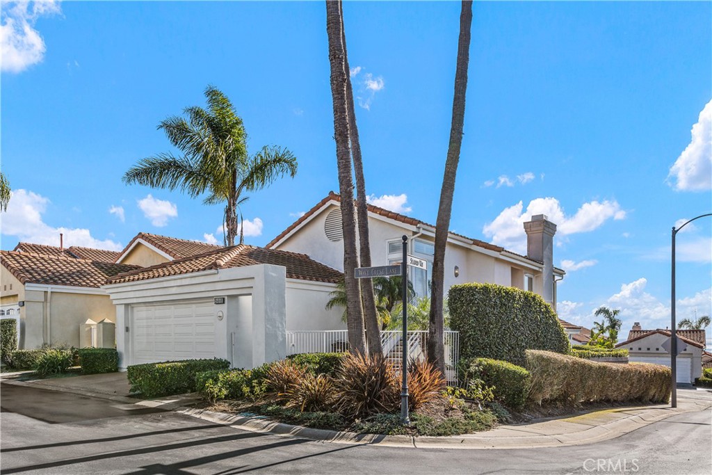 Live the Dana Point lifestyle in this nautically inspired “Ocean View” home. Located within the gated community of Waterford Point, this 3 bed, 2.5 bath residence boasts 180 degree “Ocean Views.” Enter through the Dutch doors to the open concept main living area inclusive of multiple seating and dining areas as well as a gas fireplace and “Ocean View” patio. The generously appointed, center island kitchen offers an integrated refrigerator, oven, microwave, and induction stove. The home offers a “Nantucket Interior” feel with crown molding, wainscotting, and chair rails. Downstairs are the 3 bedrooms including the Master en suite with walk-in shower, soaking tub, dual sinks, and walk in closet. The Master bedroom offers direct access to the low maintenance, private backyard with cement patio and “tropical” foliage. Additional features include oak planked wood, carpet, new paint, plantation shutters, 2 car garage, separate laundry room with washer and dryer, “mini” downstairs foyer, and single loaded cul du sac. The association amenities include a seasonally heated swimming pool, tennis courts, and jacuzzi! Walking distance to Downtown Dana Point, Dana Point Harbor, and the Lantern District with all of its numerous shopping and dining establishments. Equally close is the incredible Pacific Ocean and many of the coastal amenities provided. Minutes away to the 5 Freeway and the Ocean Ranch Shopping Center containing Trader Joe's and a Cinepolis Movie Theater. A must see "Ocean View" property!