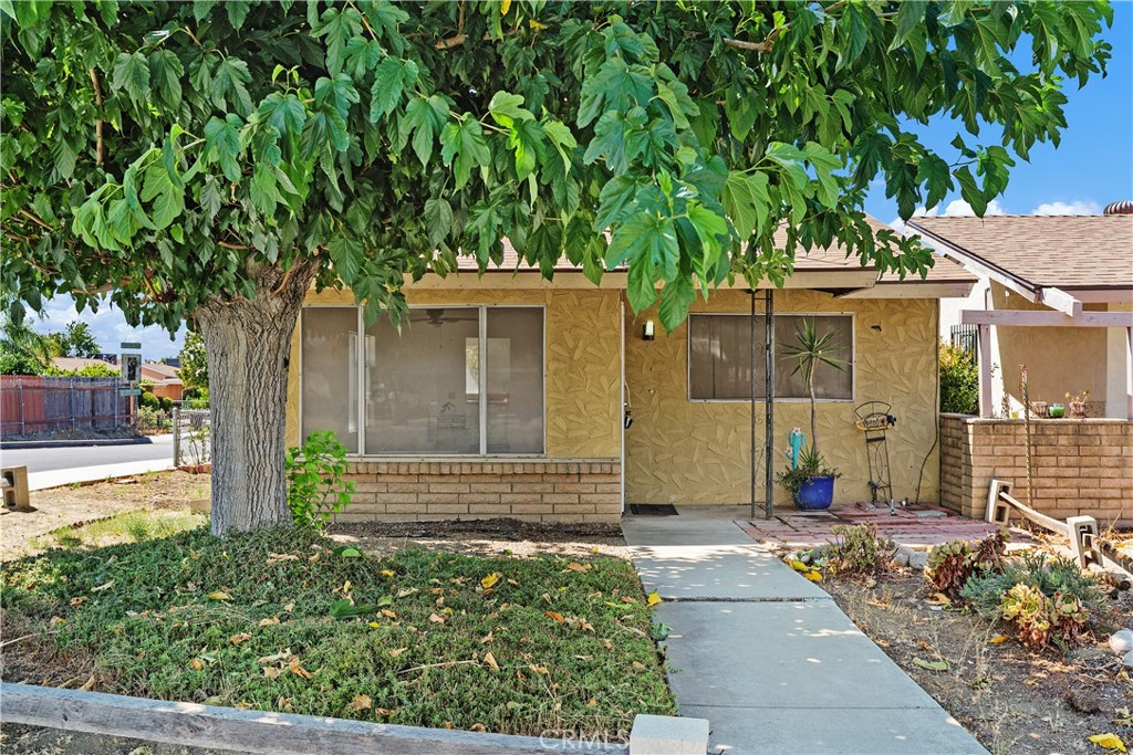 Discover this delightful 1976-built single-story home, nestled on a spacious corner lot in a prime Hemet location. Home features 2 bedrooms and 2 full baths. The home offers an ideal layout for downsizers, small families, or savvy investors. Pergo flooring graces the living area, while just-cozy bedrooms await your personal touch with carpeted flooring comfort. New Recessed Lighting throughout! Newly Painted throughout! New kitchen counter top with new sink and faucet. Forget hauling the laundry—this property includes convenient indoor laundry area. The detached 2-car garage adds both storage and practicality. Enjoy easy access to nearby shopping, schools, and commutes. Don’t miss out on a corner-lot home that's comfortable, secure, and loaded with value!