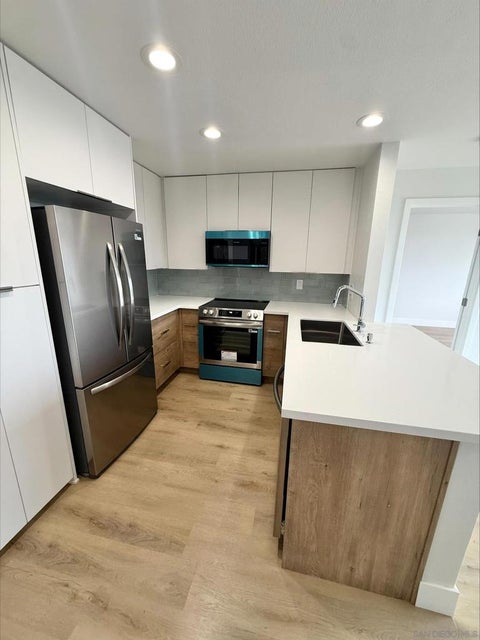 Photo of 3020 Cowley Way Way #209, San Diego, CA 92117 (MLS # 260025068SD)
