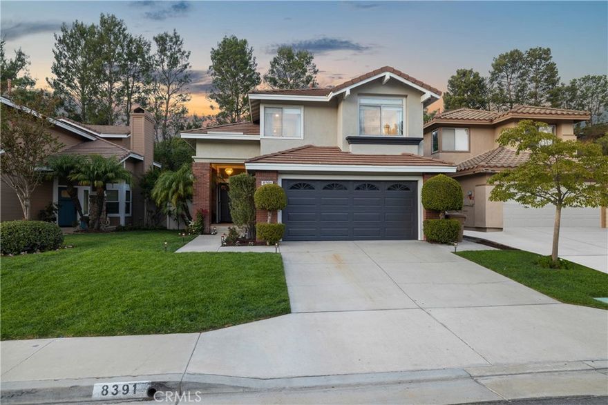 Located in Anaheim Hills’ coveted dual cul-de-sac community of Vintage Place, this 4 bed 2.5 bath home blends timeless elegance with modern upgrades. Upon entry, you'll find cathedral ceilings, abundance of natural light, and designer touches including wooden shutters, chandeliers, and rich wide plank flooring. The kitchen features freshly painted cabinetry, granite counters, stainless steel smart appliances, farmhouse sink, and peninsula with bar seating. On the second level, the spacious primary retreat offers new luxury vinyl floors, dual walk-in closets and a fully remodeled spa-like bathroom featuring dual vanities with quartz counters and an expansive shower with dual rain heads, bench seating, and skylight. Three additional bedrooms include two generous guest rooms plus a versatile room with built-in desk and Murphy bed. Designed for entertaining, the updated private backyard boasts stone hardscape, artificial turf, new landscaping, up-lighting, and a built-in outdoor Summerset BBQ. Additional highlights include freshly painted exterior, water softening system, reverse osmosis drinking water, central HVAC plus split A/C in every bedroom, and a finished 2-car garage with epoxy floors and built-in storage. Ideally located near top-rated schools, parks, dining, and entertainment, this home offers the perfect blend of luxury, comfort, and convenience in one of Anaheim Hills’ most sought-after neighborhoods.