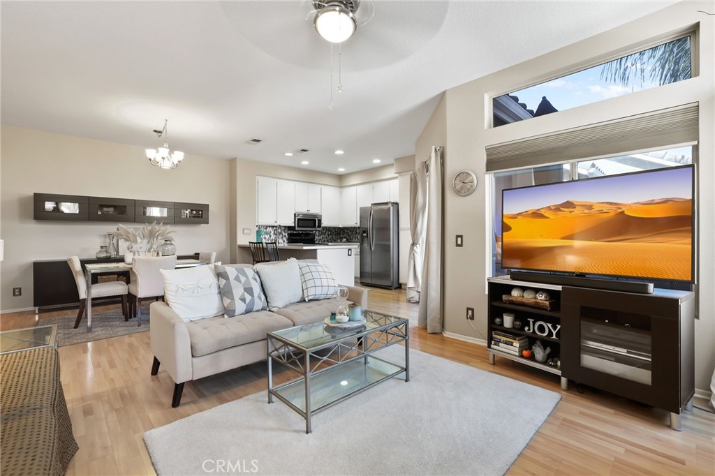Imagine stepping into your very own, private sanctuary–a stunning carriage unit in the highly desirable Montecido Community. This isn't just a home; it's the perfect launchpad for your homeownership journey, offering an unbeatable blend of comfort, style & an incredible lifestyle. Forget about noisy upstairs neighbors or downstairs distractions; with no one above & no one below, this home is your quiet haven. You'll love the spacious, open-concept layout, where the kitchen, dining & family rooms flow seamlessly together, making it ideal for entertaining friends or simply relaxing after a long day. The upgraded kitchen is a true showstopper, ready for your culinary adventures. Picture yourself cooking on a gas stove, surrounded by sleek stone counters, a stylish backsplash & brand-new hardware. Freshly painted & meticulously cared for, this kitchen is as beautiful as it is functional. Your luxurious primary bedroom is serene escape, featuring custom-built walk-in closet that will impress even the most organized. The completely remodeled & reimagined en-suite bathroom is spa-like retreat, boasting custom features that are sure to delight. The secondary bathroom has also been updated & you'll appreciate thoughtful touches throughout like ceiling fans, elegant window coverings & newer AC unit to keep you comfortable year-round. Every corner of this freshly painted home radiates warmth & care–it's truly move-in ready! But the allure doesn't stop at your doorstep. This isn't just a home; it's a gateway to an active & vibrant lifestyle. You'll be moments away from major conveniences, with easy access to toll roads and the 133 freeway, whisking you directly to the sun-kissed shores of Laguna Beach. Enjoy world-class shopping and dining at Irvine Spectrum or explore the endless possibilities at The Great Park. For the outdoor enthusiast, this location is a dream come true! Step out your door and discover an adventurer's paradise with hiking and mountain biking trails in Cleveland National Forest right in your backyard. Explore equestrian centers, or hit Trabuco Canyon Road for OHV, MTB, gravel, and road cycling. Whiting Ranch Wilderness Park is just a few minutes' walk away, offering even more trails to explore. Plus, for the thrill-seekers, there's a skate park and the Oakley Dirt Lab nearby. This isn't just a house; it's the perfect place to start building your future. Don't miss this incredible opportunity to own a well-loved home that truly has it all!