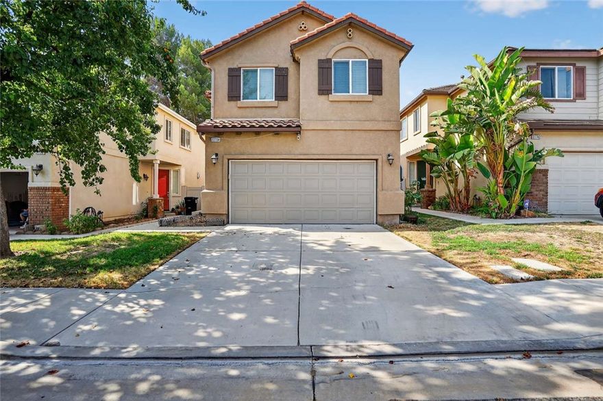 Move-in ready 1,933 sq ft home in Stratara North, built in 2006. Features include an open floor plan, high ceilings, hardwood floors, upgraded kitchen with granite counters and stainless steel appliances, and a spacious family-room with electric fireplace. Upstairs primary suite offers a soaking tub, separate shower, and walk-in closet. Solar panels, central HVAC, 2-car garage, and hot tub. Low-maintenance yard with patio and sweeping views. Convenient to top-rated schools, shopping, and freeway access.