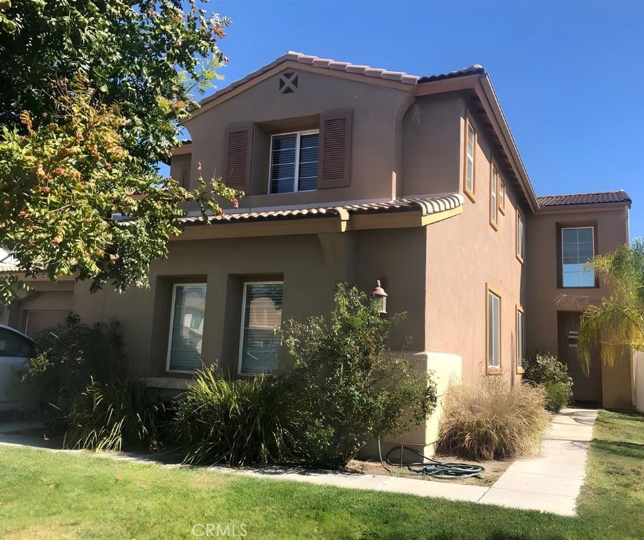 Welcome to 693 Sunnyside Boulevard, a beautifully maintained two-story home located in a quiet cul-de-sac in San Jacinto. Built in 2006, this spacious 3,255 sq ft residence sits on a 7,841 sq ft lot and offers the perfect blend of comfort and functionality. The home features 5 bedrooms, including 2 conveniently located on the main level, and 3.5 bathrooms designed for both privacy and convenience. The open-concept layout fills the living and dining areas with natural light, while the family room with fireplace creates a cozy space for gatherings. The kitchen provides ample room for entertaining, and a dedicated laundry room adds to everyday ease. Additional highlights include central air and heating, a durable tile roof, and a 663 sq ft attached two-car garage. Outside, enjoy the private pool and low-maintenance landscaping, all set within a peaceful neighborhood near parks and schools in the San Jacinto Unified School District. With no HOA fees, this property offers exceptional value whether you’re looking for a spacious family home or an investment opportunity.
