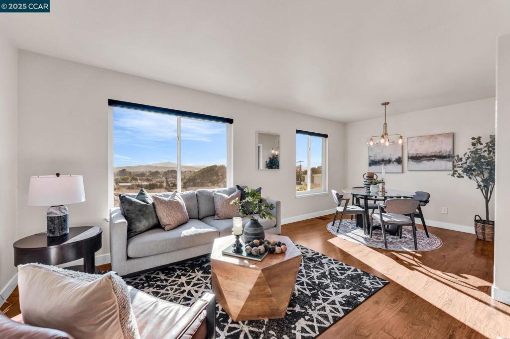 Breathtaking views of the Bay, Mt. Tam, SF skyline & Bay Bridge from this elegantly updated 3BD/2.5BA Mediterranean retreat on a peaceful cul-de-sac. Light-filled main level features a designer kitchen w/ stainless appliances, open-concept living/dining w/ fireplace, and French doors to a private patio-perfect for al fresco entertaining! Luxe primary suite upstairs with sweeping views, bath & dressing area. Recent high-end upgrades include new garage doors & system, custom carpet, paint, lighting, gutters, fencing, landscaping & more showcasing thoughtful investment and refined style. Dual-pane windows, sleek flooring, artistic finishes & low-maintenance native garden. Oversized 2-car garage , wide driveway & ample parking. Exceptional location near parks, local gems, BART, Richmond ferry, freeway access, & public transportation. Fast internet, beautiful weather & great neighbors complete this exceptional move-in-ready home! This home qualifies for a limited-time lender-paid 2-1 buydown— reduced monthly payments for the first 2 years at no cost to the buyer or seller. Ask listing agent for details!