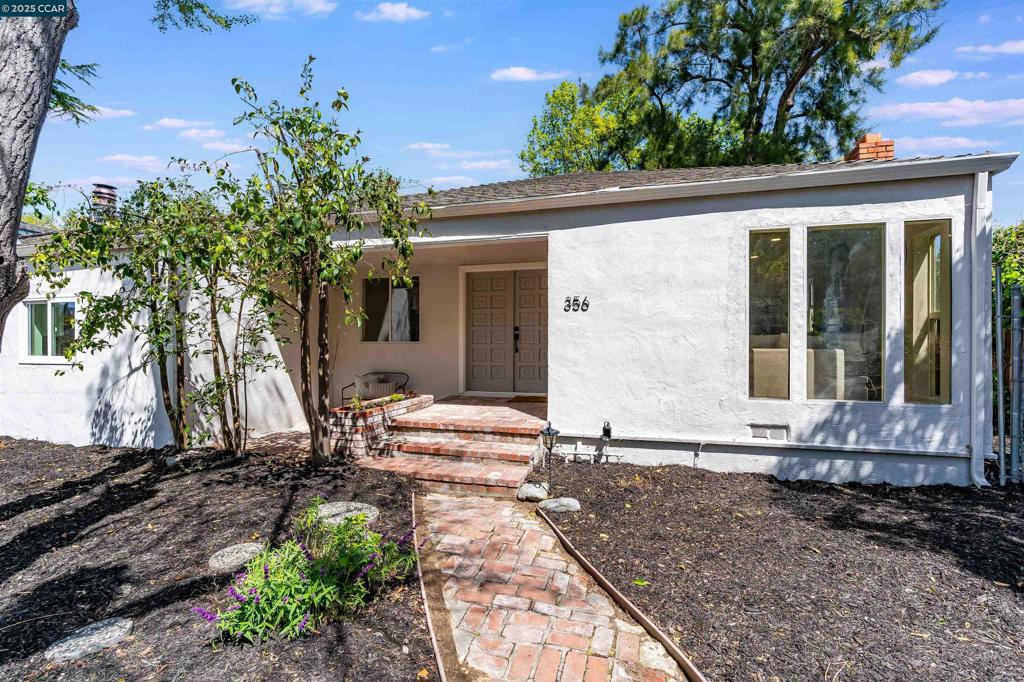 Welcome to 356 Kottinger Drive — a beautifully updated mid-century modern gem located on one of the largest lots in historic downtown Pleasanton. This sleek single-story 4-bedroom, 2-bath home sits on an expansive 14,402 sq ft lot (0.33 acres) and offers exceptional privacy, backing directly to Kottinger Village Park with no rear neighbors. Inside, you’ll find an open-concept layout featuring a fully renovated kitchen with new cabinetry, countertops, and appliances—perfect for entertaining or enjoying quiet evenings at home. All four bedrooms are large and both bathrooms have been stylishly updated, including the ensuite in the primary bedroom. The oversized lot provides endless possibilities—build an ADU, a pool, a detached garage, or all three. Located just a short walk from downtown Pleasanton’s charming shops and restaurants, and within a top-rated school district, this home is truly a rare opportunity. Don’t miss this private retreat in one of Pleasanton’s most desirable neighborhoods!