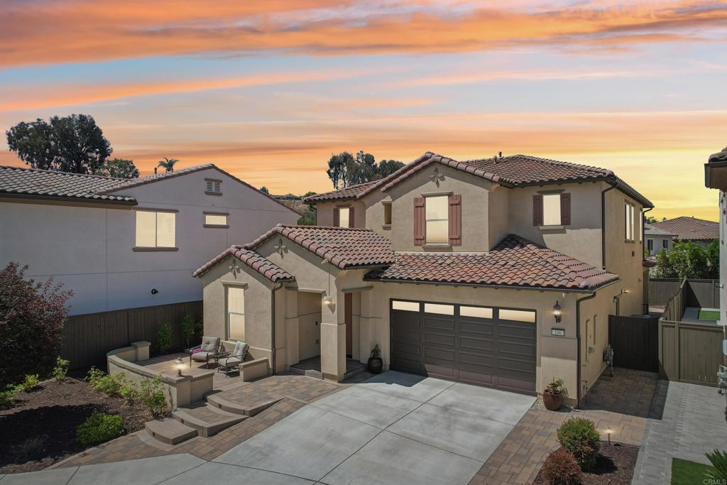 Welcome to the highly sought-after gated community of Laurel Pointe in Vista. Beautifully upgraded home offering style, functionality, and comfort. This spacious residence is located at the end of a cul-de-sac and features luxury vinyl plank flooring throughout the main living areas, along with a desirable downstairs bedroom and full bathroom, perfect for guests or multi-generational living. The open-concept layout seamlessly connects the living room and kitchen, which is equipped with granite countertops, stainless steel appliances, and a large walk-in pantry. Just off the entry is a convenient office nook, ideal for working from home. Upstairs, you’ll find a spacious loft, along with the primary retreat featuring a generous bathroom with a dual-sink vanity and plenty of counter space. Two additional generously sized bedrooms and a guest bathroom complete the upper level. Enjoy custom blinds and plantation shutters throughout, a low-maintenance backyard with custom pavers and a water-efficient drip irrigation system. The 2-car garage boasts epoxy flooring and a tankless water heater for modern convenience. Located in a convenient Vista neighborhood near shops, dining, and commuter routes, this move-in ready home is a fantastic opportunity!