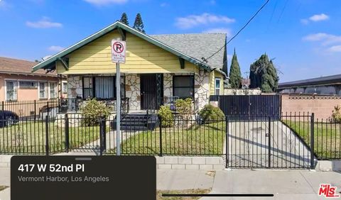 Photo of 417 W 52nd Place, Los Angeles, CA 90037 (MLS # 25596811)