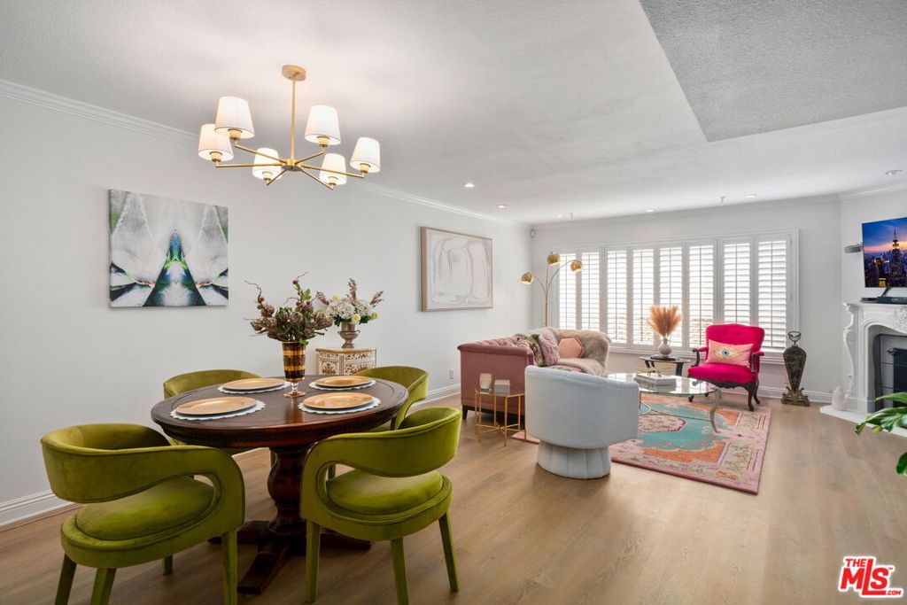 Sophisticated Turn-Key Townhouse in Studio City. This elegant townhouse blends modern luxury with timeless design, just steps from Tujunga Village and minutes from major studios. The open-concept main level showcases a kitchen with hand-carved granite, custom cabinetry, and top-of-the-line appliances. Flow into a light-filled dining and living area with a cozy fireplace, recessed lighting, and vinyl plank floors throughout. A stylish powder room completes the first level.Upstairs, two en-suite retreats offer comfort and sophistication. The primary suite features vaulted ceilings, a walk-in closet, French doors to a private balcony, and a spa-inspired bath with a clawfoot tub and travertine stone throughout. The second suite has plenty of natural light, ample closet space, and walk-in rainfall shower elevated with a glass block wall & classic subway tile.Additional highlights include; in unit washer & dryer, copper plumbing, plantation shutters, retractable screen doors, custom blinds, 2 car subterranean parking, and additional storage unit in garage move-in ready in one of Studio City's most desirable locations. Can be delivered furnished.