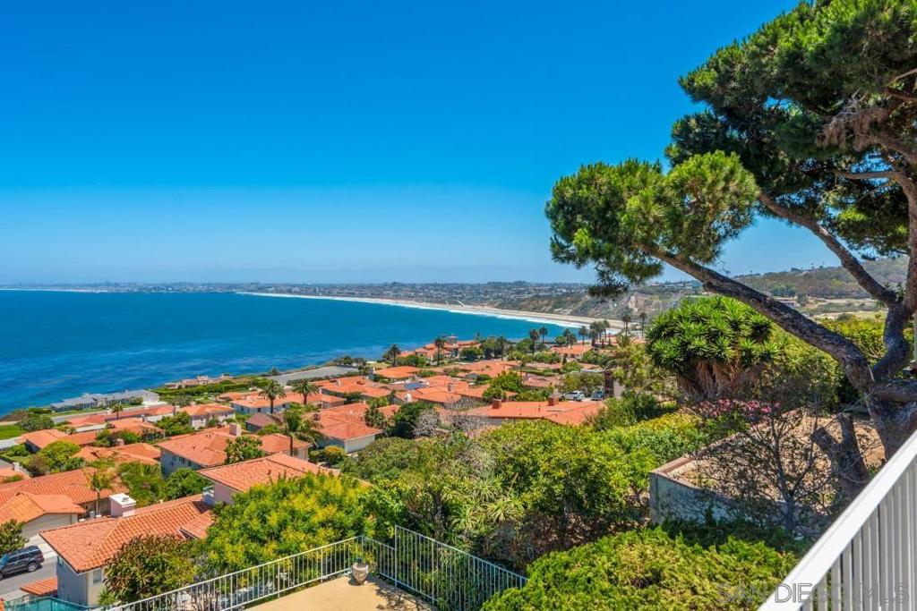 MAGNIFICENT OCEAN VIEW! Once you have parked on the curved, brick driveway and enter through the first set of double doors, you will see a hint of Santa Monica Bay in the distance. As you descend down a stone stairway you will encounter a cozy sitting area which will lead you to the main entrance. Upon entering through the wooden, glass paned, double doors, a stunning wall to wall view of Santa Monica Bay, Los Angeles Harbor, Redondo Beach, and so much more awaits you. This magnificent ocean view can be seen from every room, living room, dining room, kitchen, all bedrooms, including the family room. Sip your favorite morning and/or evening beverage from any of three decks as you take in the beauty of Santa Monica Bay. Cool off on warm summer days in the pool as you gaze out over the ocean, or you can head to the famous Redondo Beach for a refreshing dip in the ocean. Redondo Beach is a short car drive or if you prefer you can bike or hike down to award winning restaurants. Malaga Cove Plaza, a quaint village located in Palos Verdes Estate, is a must on the list to explore. This home offers a two car garage along with ample street parking. Come and partake in the beauty of this home and the magnificent views it has to offer. MAGNIFICENT OCEAN VIEW! Once you have parked on the curved, brick driveway and enter through the first set of double doors, you will see a hint of Santa Monica Bay in the distance. As you descend down a stone stairway you will encounter a cozy sitting area which will lead you to the main entrance. Upon entering through the wooden, glass paned, double doors, a stunning wall to wall view of Santa Monica Bay, Los Angeles Harbor, Redondo Beach, and so much more awaits you. This magnificent ocean view can be seen from every room, living room, dining room, kitchen, all bedrooms, including the family room. Sip your favorite morning and/or evening beverage from any of three decks as you take in the beauty of Santa Monica Bay. Cool off on warm summer days in the pool as you gaze out over the ocean, or you can head to the famous Redondo Beach for a refreshing dip in the ocean. Redondo Beach is a short car drive or if you prefer you can bike or hike down to award winning restaurants. Malaga Cove Plaza, a quaint village located in Palos Verdes Estate, is a must on the list to explore. This home offers a two car garage along with ample street parking. Come and partake in the beauty of this home and the magnificent views it has to offer. Sewer: Public Sewer Frontage: Ocean/Bluff, Ocean/Sand