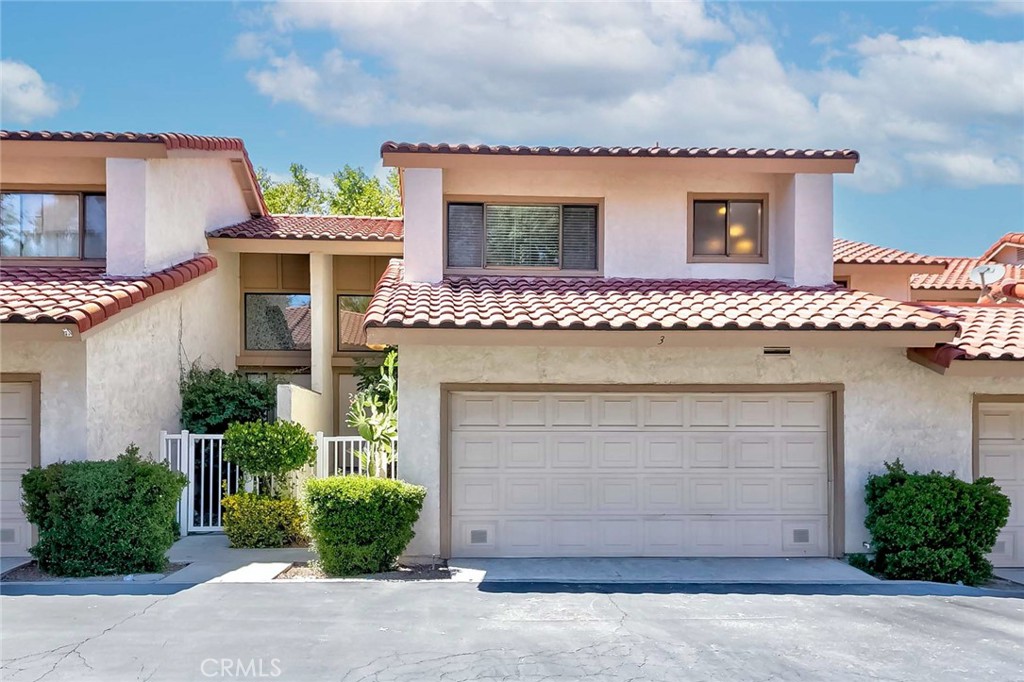 Welcome to this beautifully upgraded home located in the highly sought-after Montefino community of Diamond Bar. This meticulously maintained residence offers numerous recent upgrades, including fresh interior paint, a fully remodeled kitchen and bathrooms, new flooring throughout, and a newer air conditioning system. As you enter, you'll be immediately impressed by the abundance of natural light that fills the space. The kitchen boasts elegant quartz countertops and ample cabinetry, perfect for both everyday living and entertaining. The main level features a spacious living room with soaring ceilings and a cozy fireplace, along with a conveniently located guest bathroom. Two sliding doors provide direct access to a generously sized backyard, ideal for outdoor enjoyment. Upstairs, you’ll find two bedrooms, each with its own en-suite bathroom. One of the bedrooms also includes a private balcony, offering a relaxing outdoor retreat. Situated in a prime location, this home provides easy access to local supermarkets, top-rated schools, and major commuting routes. If you're searching for a move-in-ready home in excellent condition, this property is a must-see!