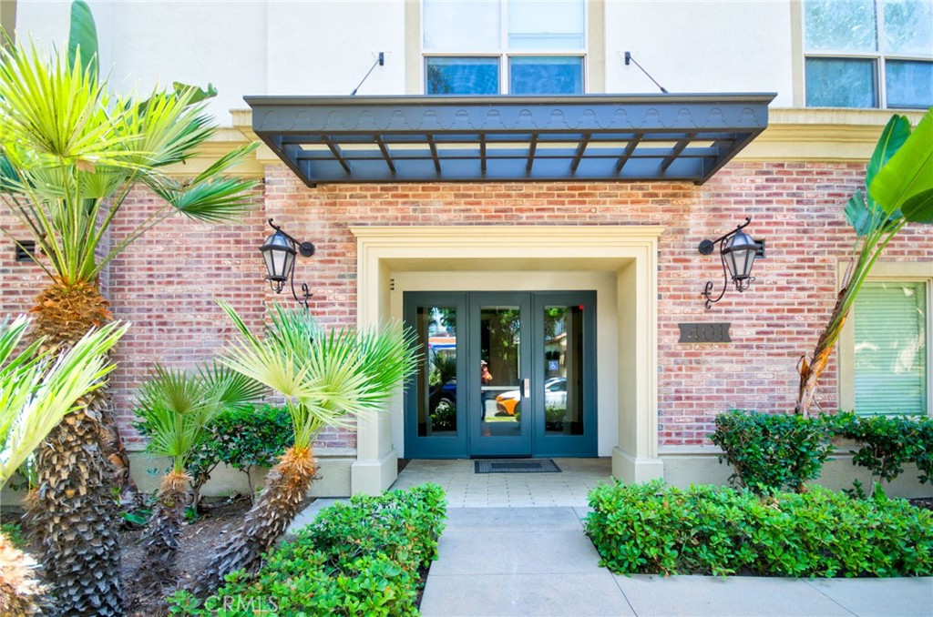 This property overlooks one of Orange County's hottest attractions today - the Anaheim Packing House and historic downtown Anaheim! This is urban living at its finest with all the amenities of a luxury condo, while being walking distance from the Anaheim Packing House, the Make building, Center Street Promenade, Farmer's park and much much more. Enjoy The Domain's rooftop patio with great seating and views of the nightly Disneyland fireworks. The community also includes elevators for convenient access to the units, a pool, fire pits, gas barbecues and automatic gates for entering the motor courts. The property boast 2 bedrooms, 2 full bathrooms, 2 car garage, private balcony and 10-foot ceilings throughout. The master suite is spacious with a walk-in closet, dual sinks and large shower. From the main living space you have views of downtown Anaheim and the Packing House/Farmer's Park. The home has central AC and heating, low-E dual pane windows, a tankless water heater and in unit washer/dryer. There is also a turnkey plug and play entertainment system with projector, projector screen, and full surround sound system that have all been professionally installed - HDMI and 1080P quality. This is the perfect place to come home to after work and walk across the street for dinner or dessert. Don't let this opportunity pass you by!