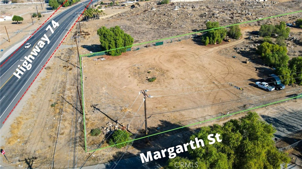 Take advantage of this rare opportunity to own a high-visibility corner lot zoned CR with extensive frontage along bustling Highway 74—exposed to heavy daily traffic, offering outstanding potential for a wide range of commercial uses. This highly desirable parcel comes equipped with city water, electricity, and an on-site well, making it ready for immediate development. Whether you’re looking to establish a retail space, service business, or investment property, this location offers unmatched exposure and convenience.