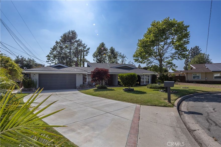 Experience comfort and tranquility in this beautifully updated single-story home for rent in Yorba Linda. This inviting 4-bedroom, 2-bath retreat features modern finishes, an open layout, and a spacious private backyard surrounded by fruit trees; perfect for relaxing or entertaining. The bright kitchen offers granite countertops, a gas range, and a walk-in pantry, complemented by updated flooring, remodeled bathrooms, and fresh paint throughout. Additional highlights include an enclosed patio, separate laundry room, extended driveway, and a two-car garage for added convenience. Nestled on a quiet cul-de-sac within the award-winning Placentia-Yorba Linda School District and just minutes from parks, shops, and dining, this home perfectly combines comfort, style, and everyday practicality. Available now—schedule your private showing today.