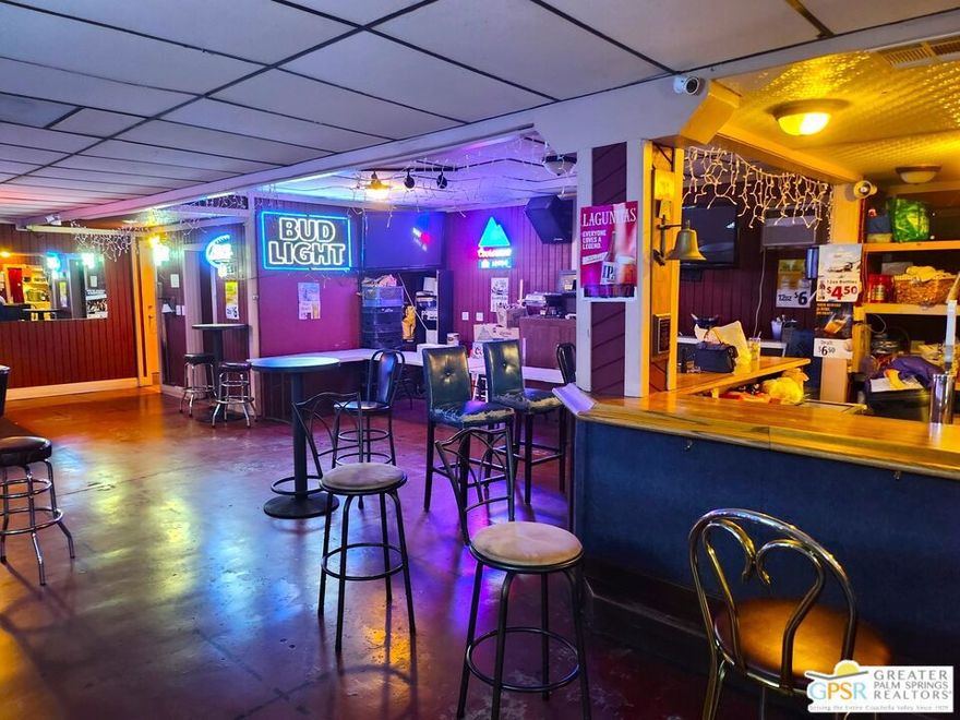 Now is an incredible opportunity to own both the building and the business at 12347 Palm Drive  currently operating as The Escapade Bar, a well-known local staple with over 20 years of successful operation. This turnkey property is located on one of the busiest corridors in Desert Hot Springs, offering excellent visibility, easy access, and high traffic exposure. The Escapade is still in full operation and continues to generate consistent income. However, the true potential lies in what this space could become. Whether you want to continue running the existing bar, rebrand the space, or develop a new concept, the possibilities are wide open. With zoning and layout suitable for a variety of uses, this property is a great fit for: A craft brewery or taproom (which the city currently lacks), a live music venue, a nightclub lounge with a dance floor, a sports bar or themed restaurant.