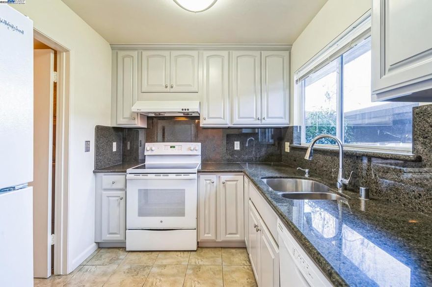 Lowest price home in the sought after Mission San Jose School District. Chadbourne, Hopkins and Mission High. Located close to Park N Ride. Plenty of street parking. This home has been well maintained. With new laminate flooring, updated kitchen and baths with tile floors, granite counters. Freshly painted. New window coverings. Large storage closet in the patio area. Oversized walk in closet in the primary bedroom. Copper Pipes. Exceptionally well run HOA that has maintained the complex. Newly updated Community Pool. Lots of green area for walking and playing. Close to Ohlone College, Freeways, Schools, Shopping and Mission Peak for the outdoor enthusiasts. Low HOA's that include water.  OH Sund 12/14 from 12-3